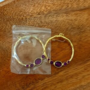 Earring with purple stone